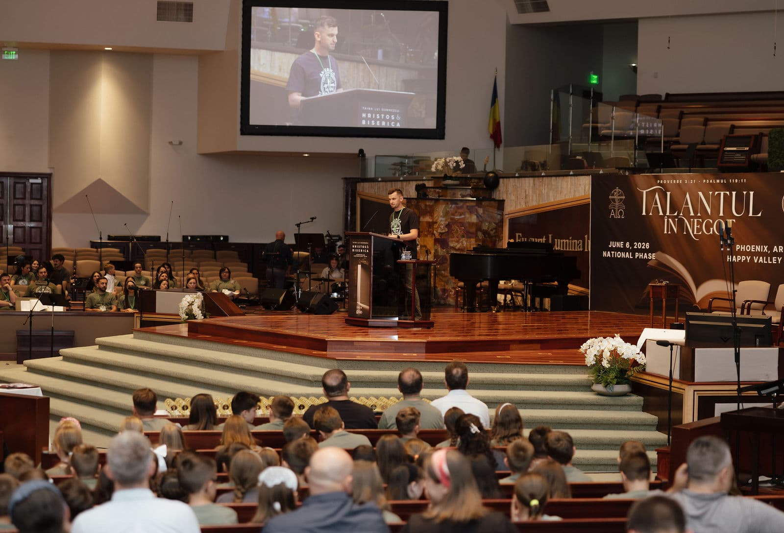 A contestant recites from the pulpit